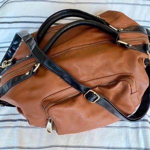 STEVE MADDEN cognac and black duffle purse